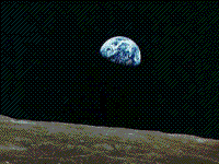 Color photograph of an Earthrise of the lip of the moon, taken during the Apollo 8 mission.