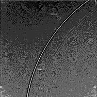 B/W image showing the faint rings and two moons of Uranus.